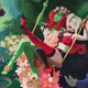 Poison Ivy and Harley Quinn together on a swing.